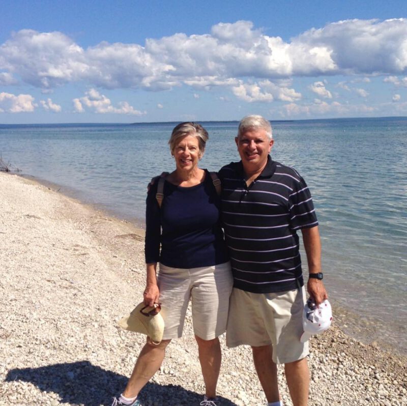 Cece and Frank Cugliari are pictured on a beach along Lake Michigan.