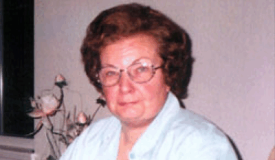 Pictured is Sara Lee Stevens-Youngs sitting at a table.