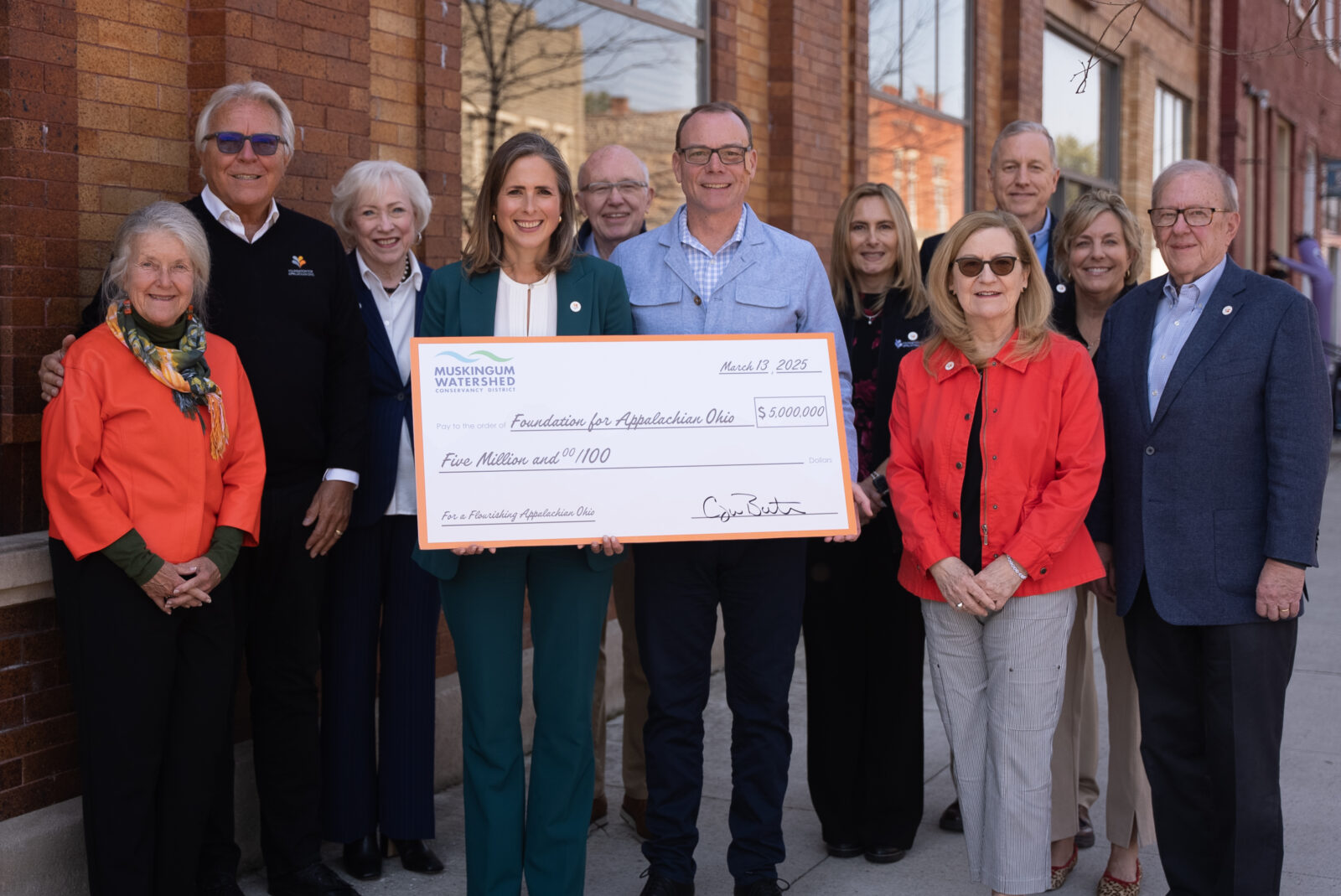 Representatives from the Muskingum Watershed Conservancy District and members of the Foundation for Appalachian Ohio Board celebrate expanded partnership to advance environmental stewardship. 