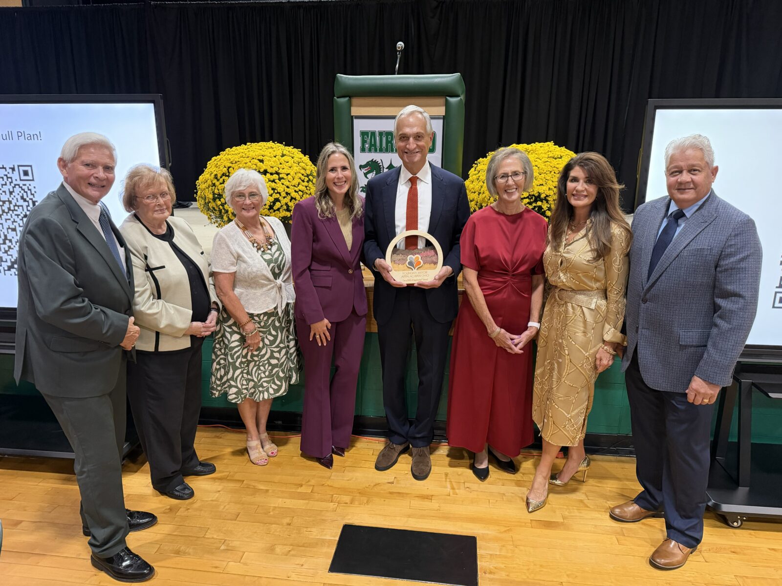 Todd DeGarmo receives the Child of Appalachia award from Cara Dingus Brook, FAO’s president and CEO, and representatives of the Lawrence County Community Foundation. Pictured (from left) are Bill Dingus, Shirley Dyer, Sandy Blackburn, Cara Dingus Brook, Todd DeGarmo, Donna Dingus, DeAnna Holliday and Dan Evans.